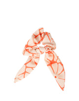 Coletero 'Naranja con flores blancas'