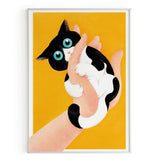 Gato mordiendo mano (amarillo)