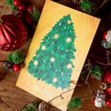 Árbol de Navidad con detalles dorados