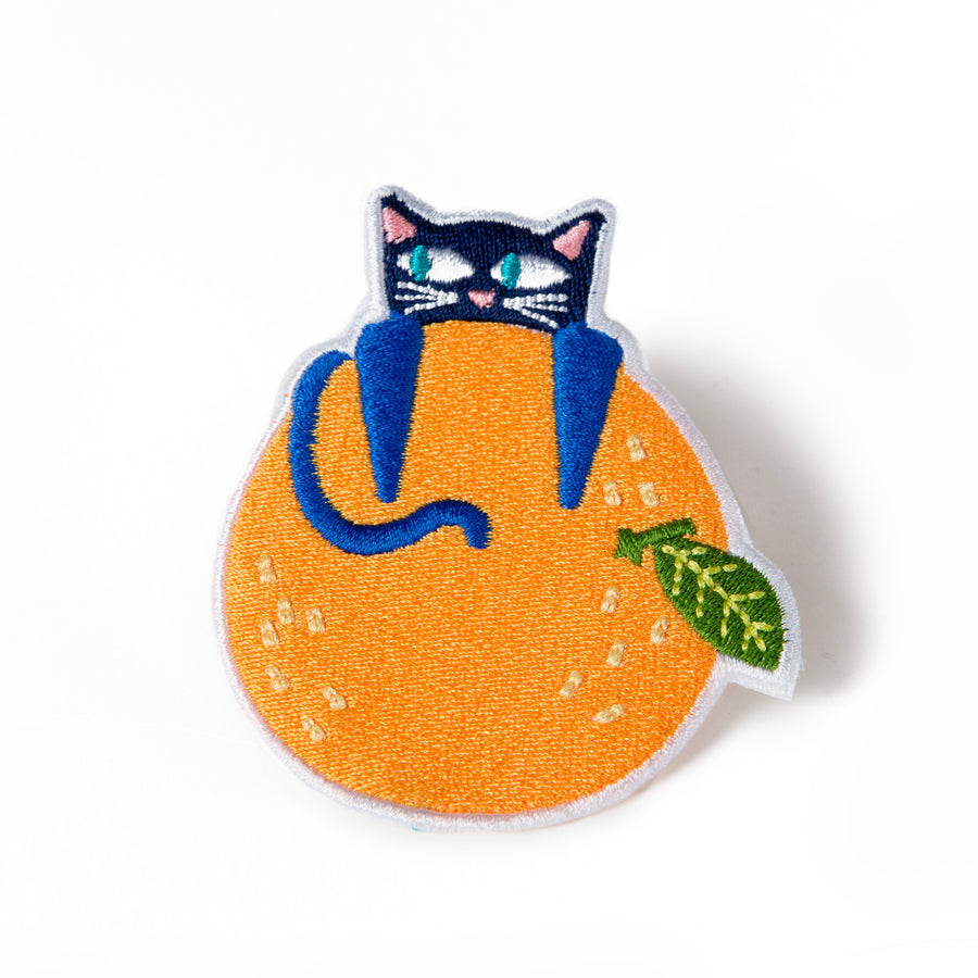 Parche gato con naranja