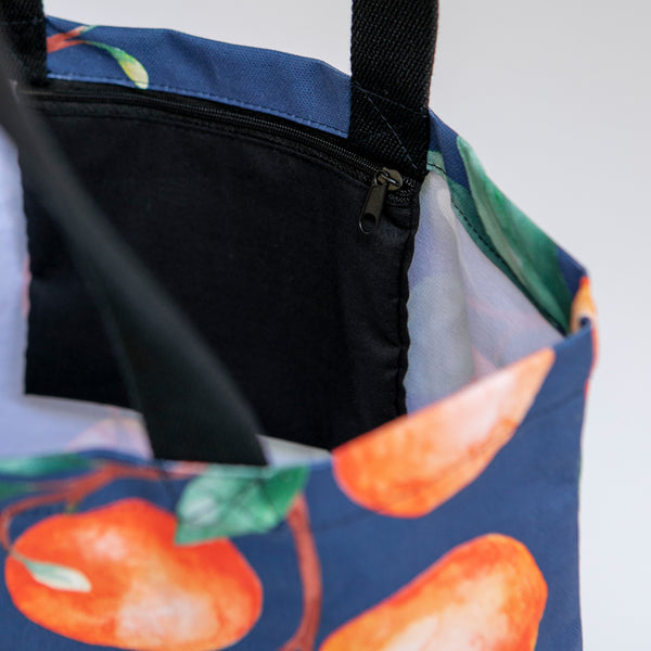 Tote bag naranjas fondo azul